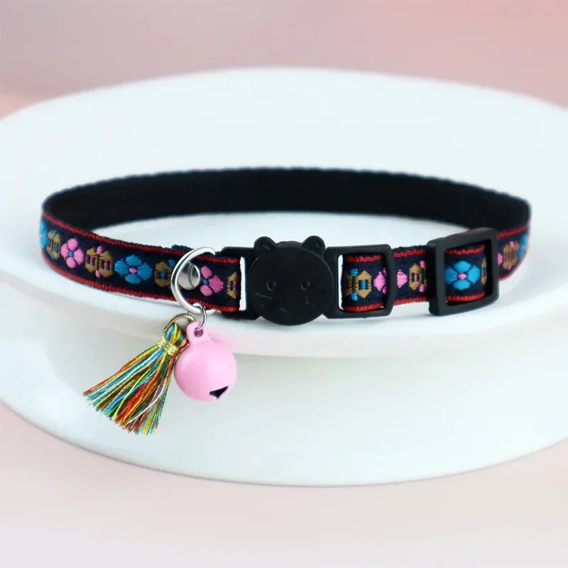Adjustable cat collar with tassels and bells