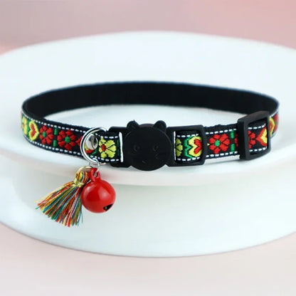 Adjustable cat collar with tassels and bells